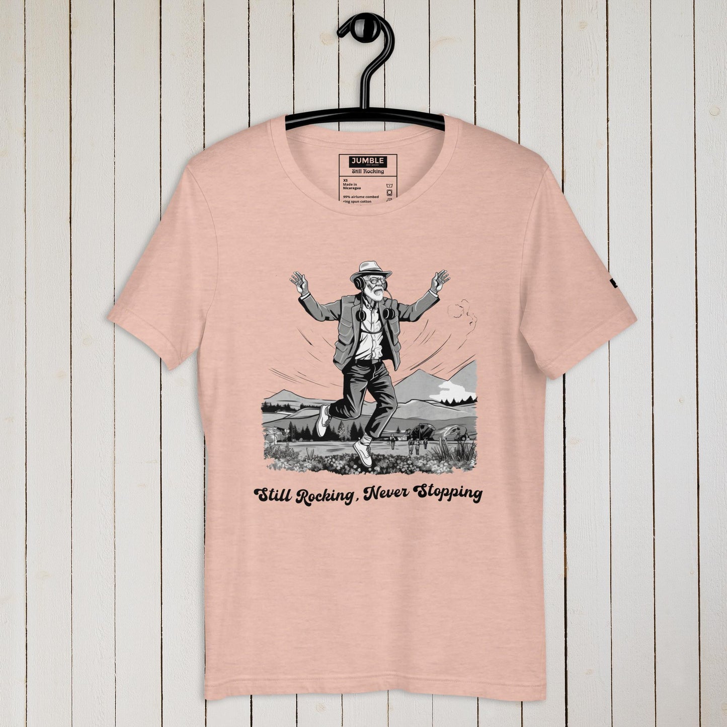 Still Rocking Unisex t-shirt-heather prism peach-on hanger