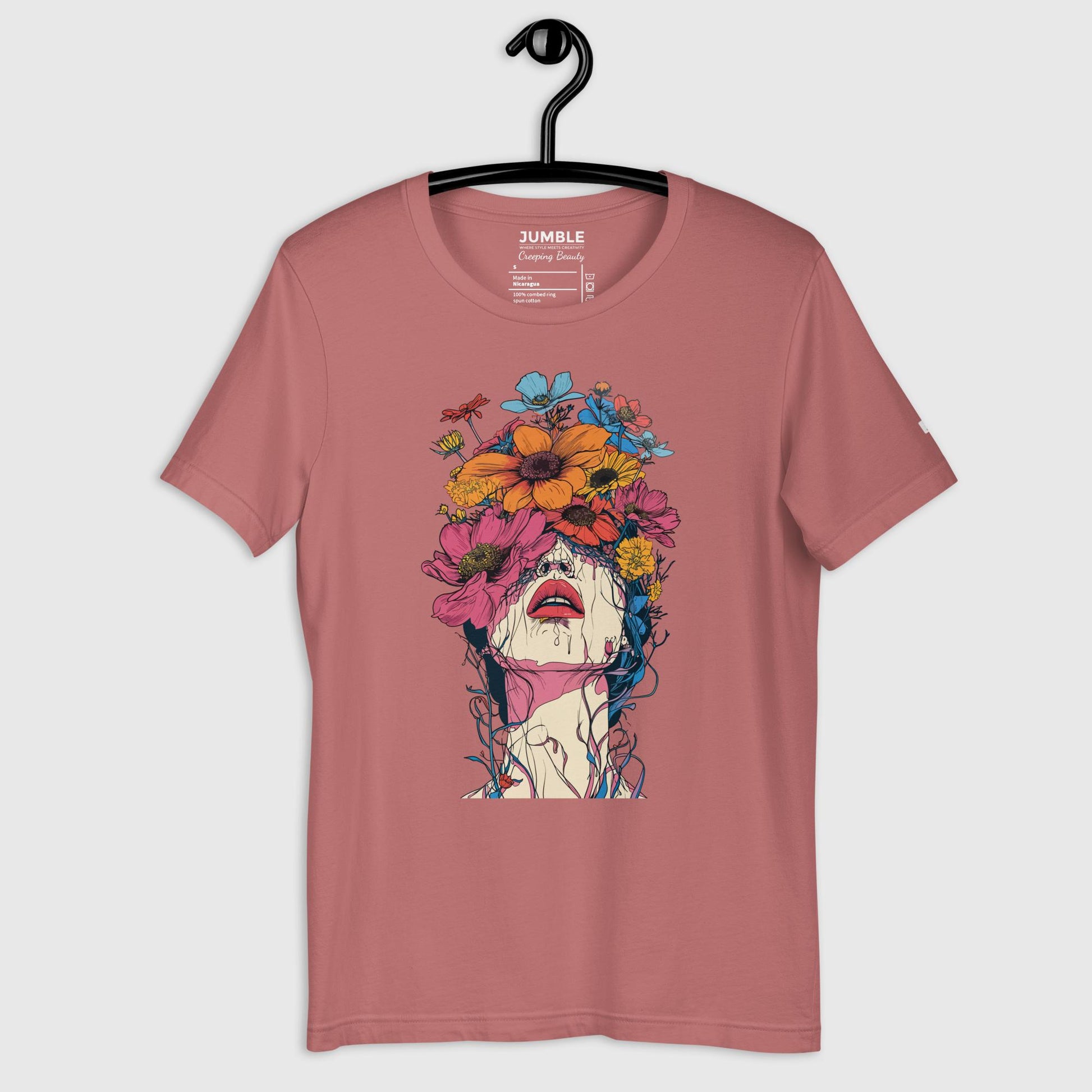 mauve Creeping Beauty Unisex t-shirt displayed on a hanger