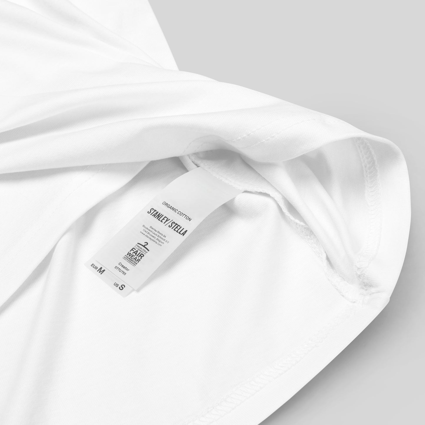 closeup of organic cotton label on white The War on Wants Unisex organic cotton t-shirt